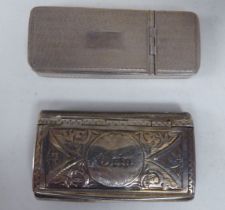 An early Victorian silver vesta case with engine turned decoration and a double hinged access  Y&