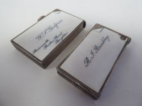 A late Victorian silver and black on white enamel vesta case, fashioned as a business card with a