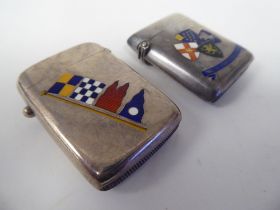 A late Victorian silver and coloured enamel vesta case of rectangular design, incorporating four