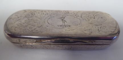 An early Victorian silver, lozenge shaped toothpick case with engraved ornament and a hinged lid