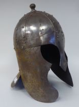 A Medieval design knight's, Babute style, rivetted steel helmet