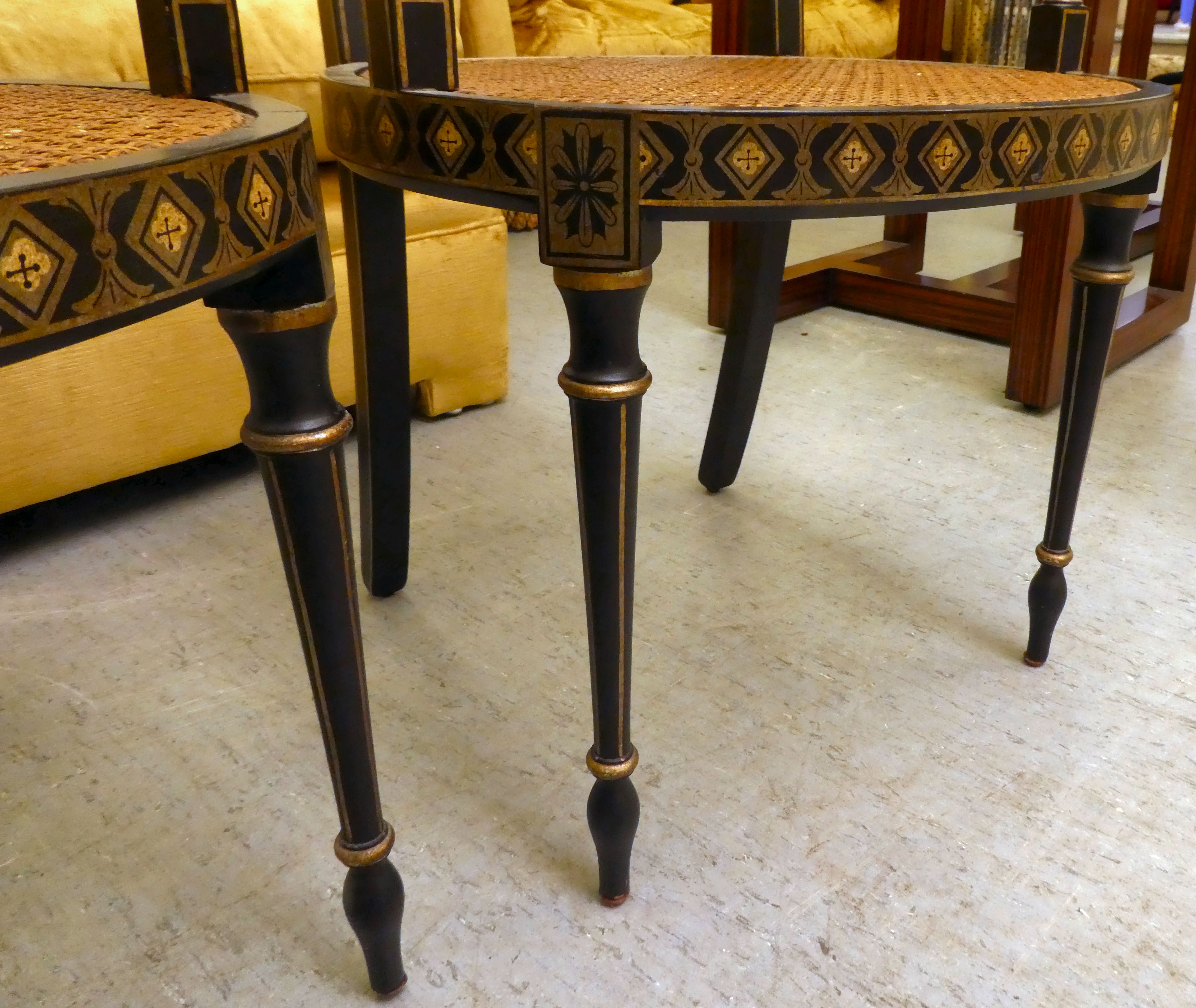 A pair of early 19thC style black painted and gilded beech framed chairs, each having a curved - Image 6 of 6