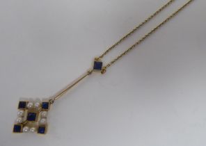 A 15ct gold sapphire and seed pearl pendant necklace