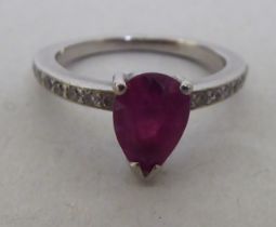 An 18ct white gold rubellite and diamond claw set ring