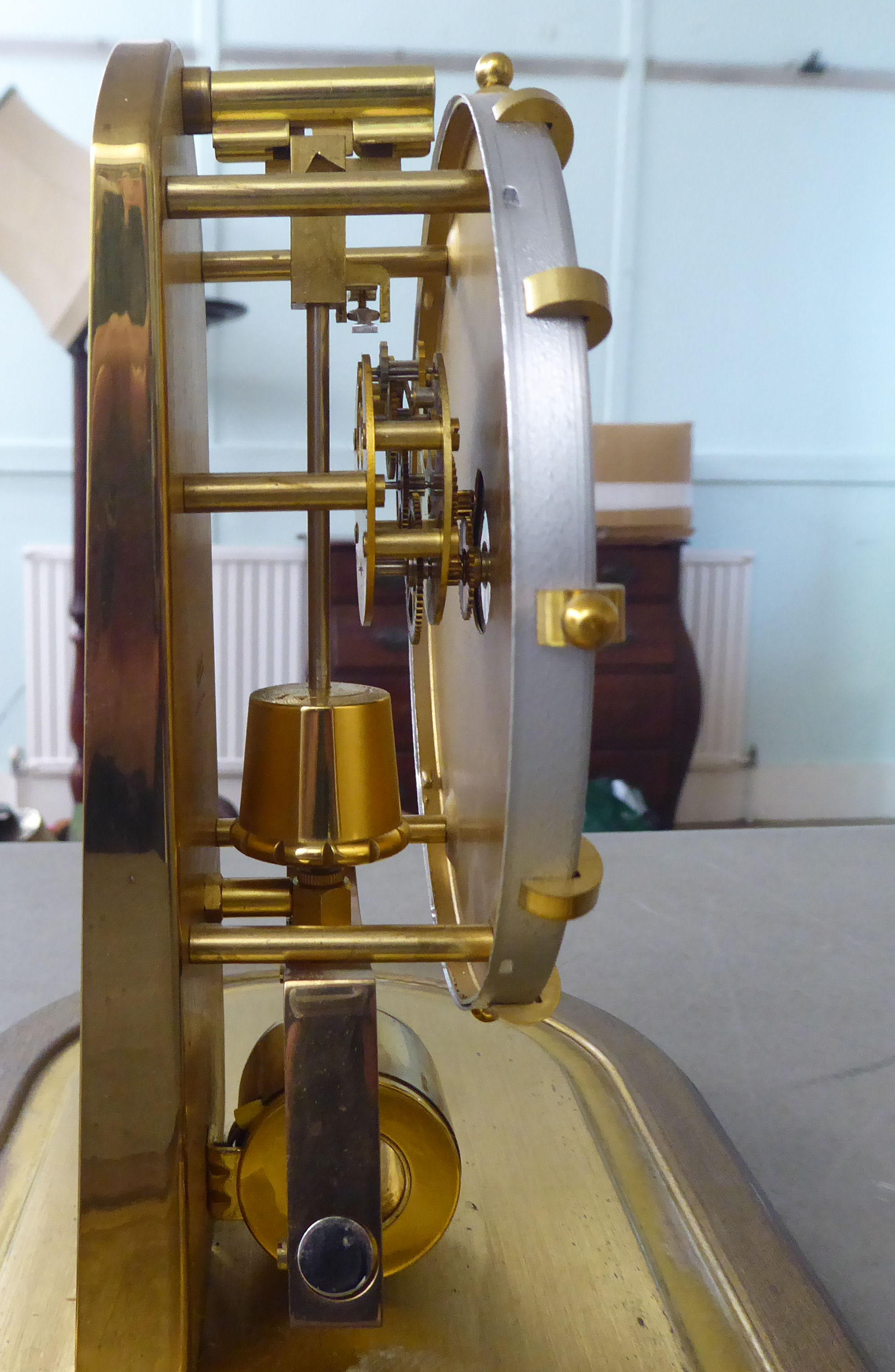 A Kundo Electromagnetic mantel clock; the exposed movement faced by a baton dial  9''h under a glass - Image 3 of 6