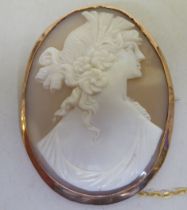 A 9ct gold framed oval cameo brooch, carved with a head and shoulders profile portrait
