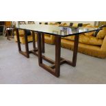 A Ralph Lauren simulated teak veneered table  29"h with a plate glass top  80"L  40"w