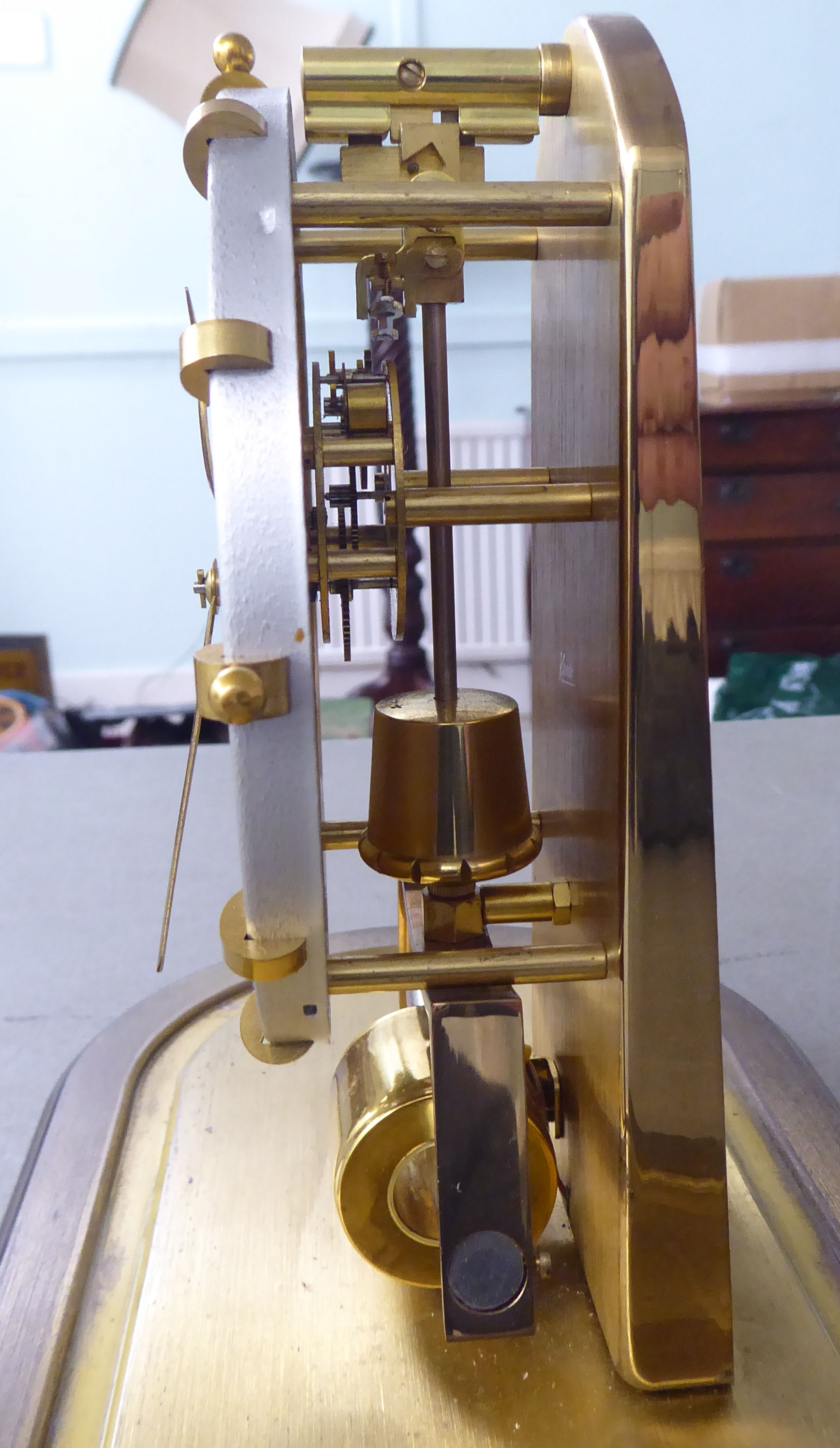 A Kundo Electromagnetic mantel clock; the exposed movement faced by a baton dial  9''h under a glass - Image 6 of 6