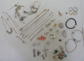 Silver and white metal items of personal ornament: to include a pair of LOVE earrings; and