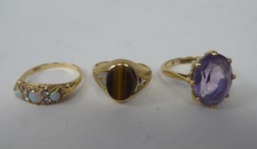 Three 9ct gold rings, variously stone set