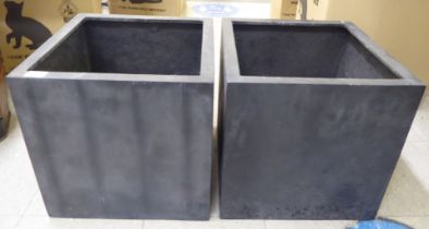 A pair of modern black composition planters  15"h  15"sq