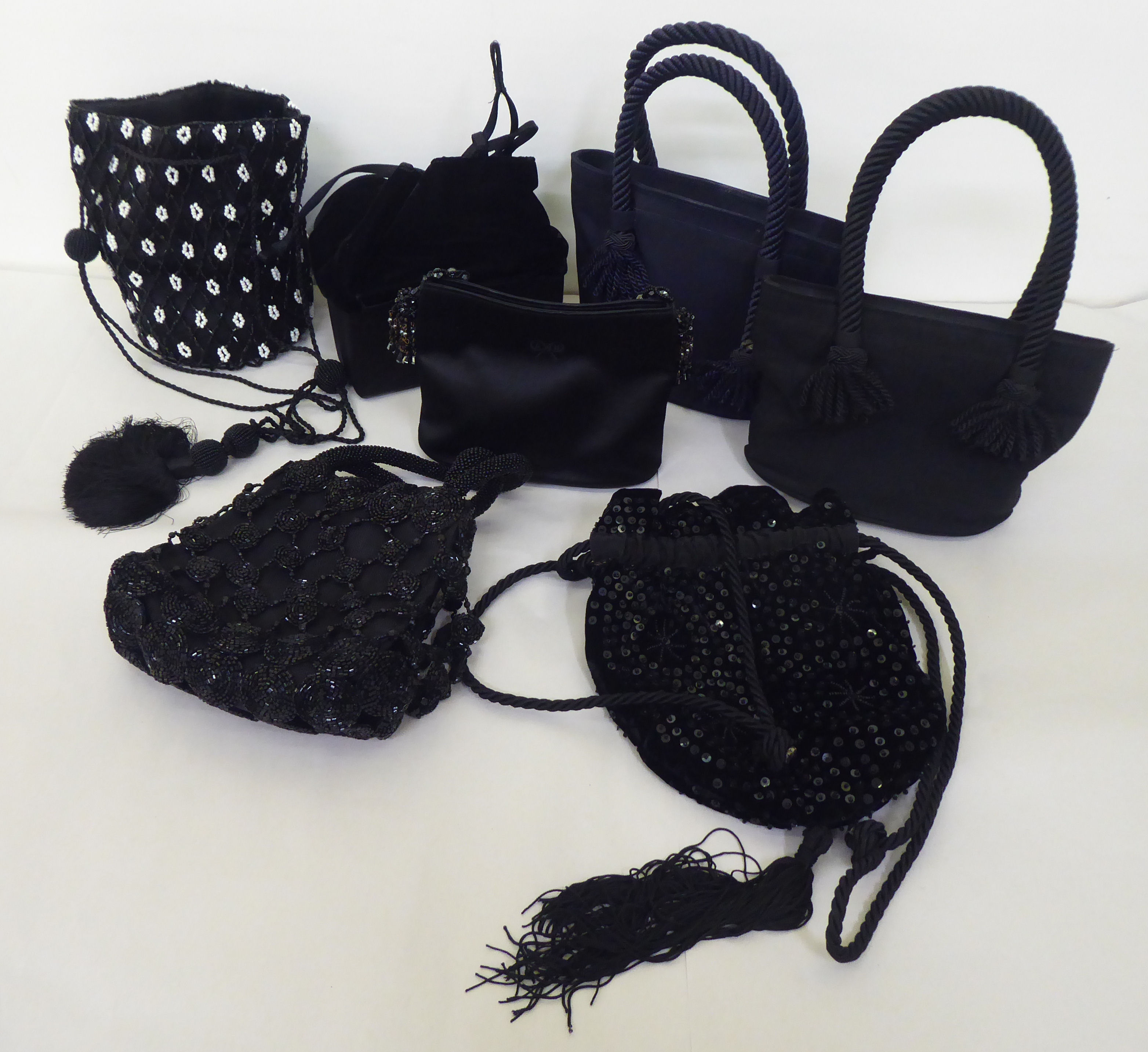 Seven black evening bags, variously decorated in beads and sequins: to include an Anya Hindmarch and