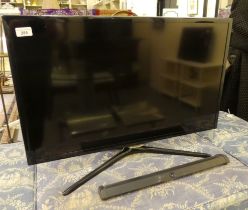 A Samsung 30" television  (no power cables or remote control)