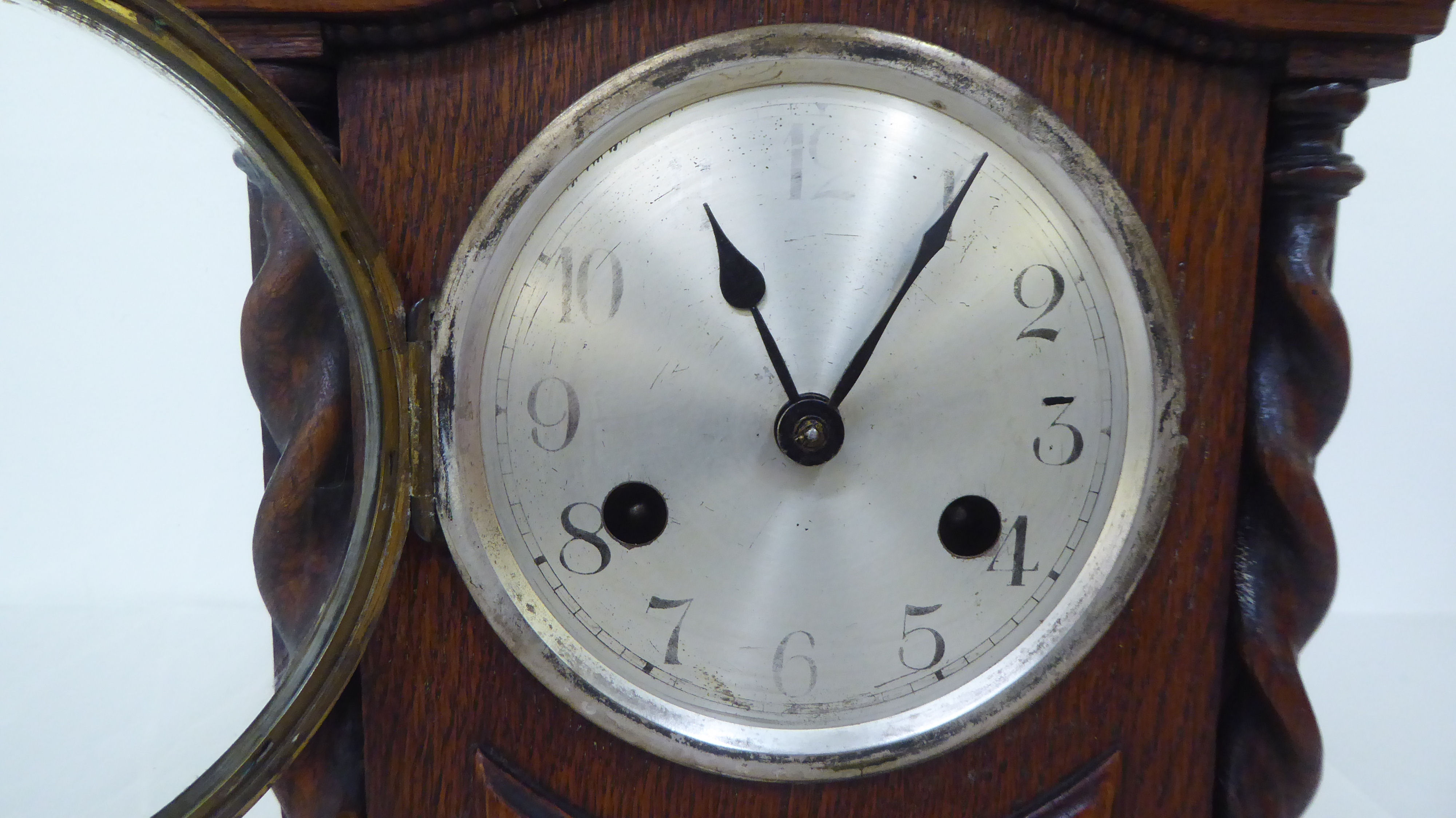 A 1930s oak cased mantel clock; the 8 day movement faced by an Arabic dial  11"h - Image 2 of 2