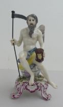 A 20thC European porcelain figure 'Chronos'  6.25"h