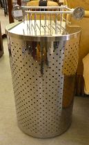 A ventilated steel cylindrical linen bin and cover  24"h; and a wall mountable bathroom rack