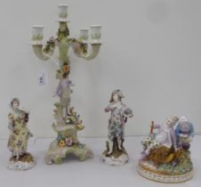 Four items of 20thC Continental porcelain: to include a juvenile group  5"h