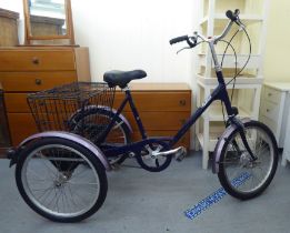 A Pashley 3 gear tricycle with 19"dia wheels and a rear storage cage