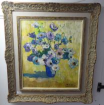 M Llabara - a floral study  oil on board  bears a signature  21" x 17"  framed