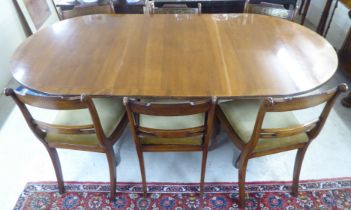 Reproduction Regency style dining furniture, viz. a mahogany twin pedestal table  30"h  50"L with an