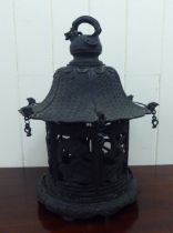 A Chinese bronze finished, metal hanging lantern of pagoda design  14"h