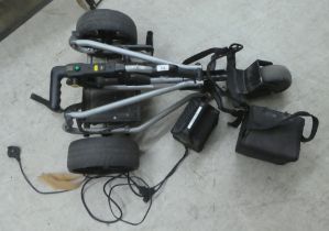 A battery powered Powakaddy golf trolley  (sold as seen, neither tried nor tested)