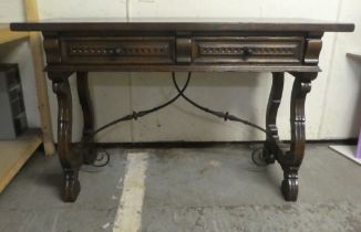 A traditional Old English 19thC style oak two drawer serving table, raised on lyre shaped pierced