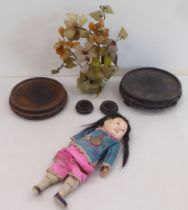 20thC Chinese collectables: to include hardwood plinths  largest  3"dia; and a composition doll