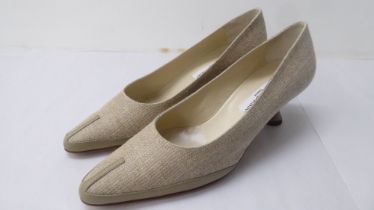 A pair of ladies Manolo Blahnik fabric and leather bound, low heeled shoes  size 39 with a dust bag