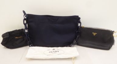 A Prada Borsa in Tessuto Bleu handbag with plastic chain handle; a Prada black jacquard reticule