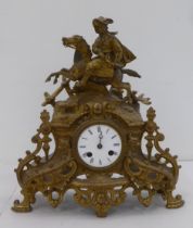 An early/mid 20thC French gilded spelter mantel clock, fashioned as a cavalier on horseback; the