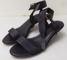 A pair of ladies Kurt Geiger black leather, low heeled, open toe shoes  size 39