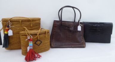 Two raffia 1960s style bags; a Joan & David brown handbag; and a Krizia black clutch bag