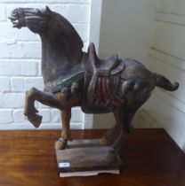 A modern gilt, overpainted softwood model, a horse  23"h