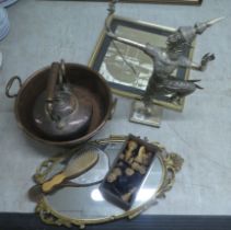A mixed lot: to include two items of vintage copper cookware; and a modern silvered figure of a Thai