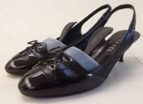 A pair of ladies Gucci faux fur and black leather, low heeled shoes  size 39 with a dust bag