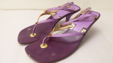 A pair of ladies Louis Vuitton two tone purple leather, low heeled, open toe shoes  size 40.5 with a