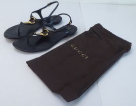 A pair of ladies Gucci black leather sandals  size 39 with a dust bag