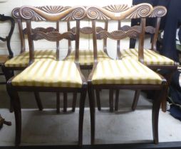 A set of five William IV mahogany framed shell and fan carved, twin bar back dining chairs, the