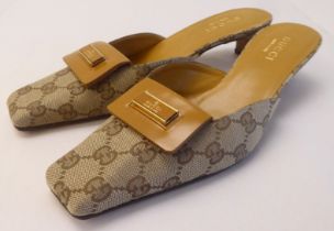 A pair of ladies Gucci tan leather and patterned fabric, low heeled sandals  size 39