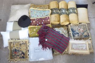 Variously sized, patterned and fabric scatter cushions