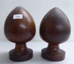 A pair of late 18thC turned mahogany acorn shape post finials  10.5"h