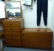 1980s teak bedroom furniture, viz. a dressing mirror  23"h  24"w; a four drawer dressing chest, on a