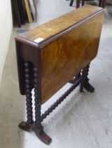 An early 20thC burr walnut finished, bobbin turned mahogany Sutherland occasional table  23"h  24"w