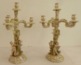 A pair of late 19thC Continental porcelain triple branch candelabra, each fashioned as a tree,