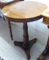 A 19thC rosewood pedestal table, on a turned column and concave triform base  27.5"h  20"dia