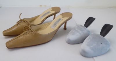 A pair of ladies Jimmy Choo cream and brown leather, low heeled sandals  size 39 with a dust bag