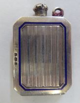 An early 20thC silver coloured metal and blue enamel, box design lighter with a screw cap,