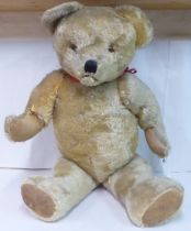 An early/mid 20thC mohair covered Teddy bear with mobile limbs  34"h
