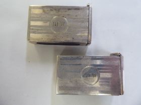 A pair of silver matchbox sleeves with hinged caps and provision for strike plates  Birmingham 1919